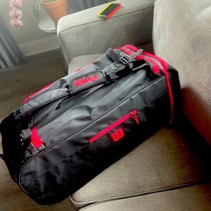 Black & Rex Wilson sports bag. Great for athletic equipment, travel or storage.